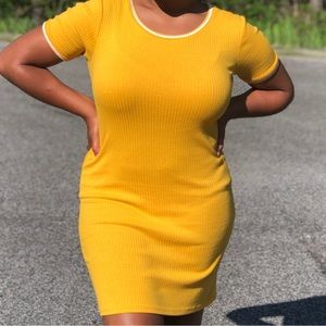 This is a Yellow dress from Rue21 in size L! Perfect for spring and summer!